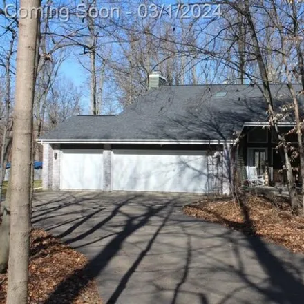 Buy this 4 bed house on 1081 Western Woods Drive in Clayton Charter Township, MI 48532