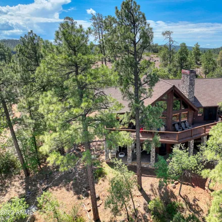 Buy this 4 bed house on 3499 Falling Leaf Road in Show Low, AZ 85901