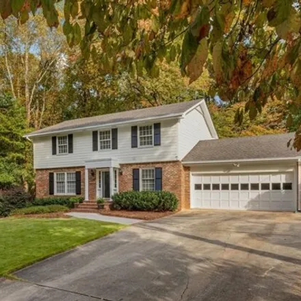 Buy this 4 bed house on 1668 Parliament Drive in Dunwoody, GA 30338