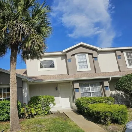 Rent this 3 bed townhouse on 14647 Laguna Beach Circle in Meadow Woods, Orange County