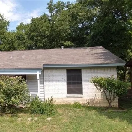 Rent this 4 bed house on 5903 Breezewood Drive in Austin, TX 78745