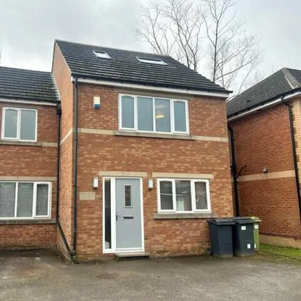 Rent this 4 bed house on Greenfield Court in Leeds, LS16 7YB