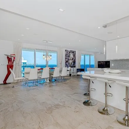 Rent this 4 bed condo on 2301 Collins Avenue