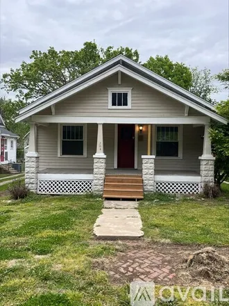 Rent this 3 bed house on 704 W 2nd St