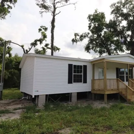 Buy this studio apartment on 302 Se Mccray Ave in Lake City, Florida