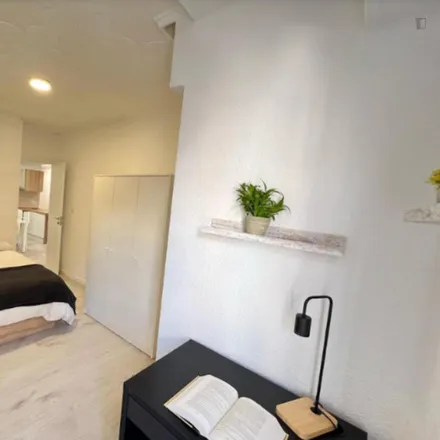 Rent this 4 bed room on Garrigós in Carrer de Maties Perelló, 46005 Valencia
