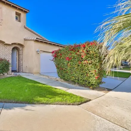 Rent this 4 bed house on Girasole Way in Indio, CA 92203