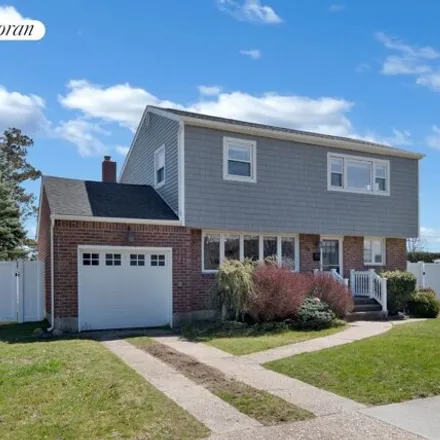 Buy this 4 bed house on 34 Silber Avenue in Swedetown Village, Bethpage