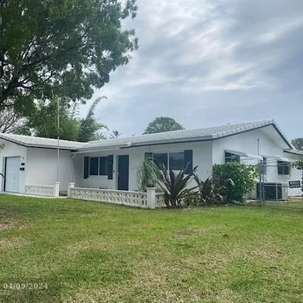 Buy this 3 bed house on 4488 Northwest 19th Avenue in Broward County, FL 33309