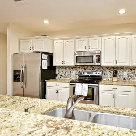 Rent this 4 bed condo on New Braunfels