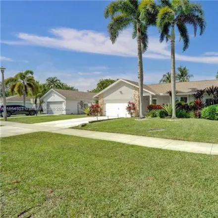 Buy this 3 bed house on 4270 Northwest 7th Place in Deerfield Beach, FL 33442