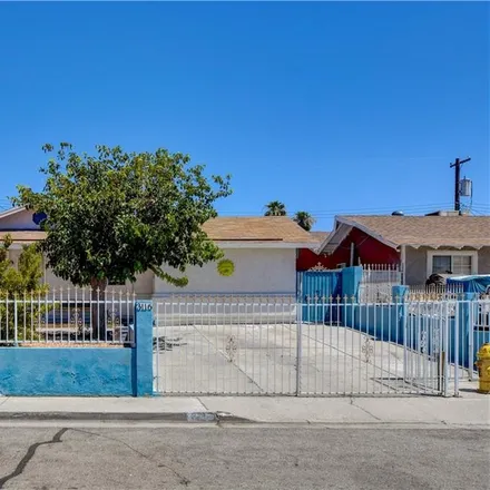 Buy this 4 bed house on 3116 East Bartlett Avenue in North Las Vegas, NV 89030