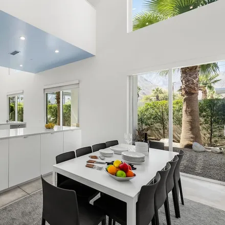 Rent this 4 bed condo on Palm Springs