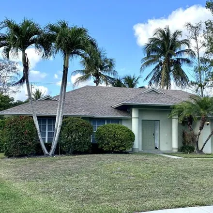Rent this 3 bed house on Greenview Shores Boulevard in Wellington, FL 33414