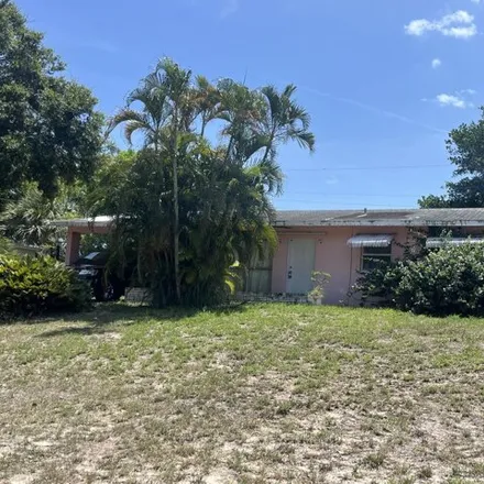 Buy this 2 bed house on 1425 Ne Waveland Ave in Jensen Beach, Florida