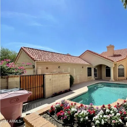 Rent this 3 bed house on 11218 East Mercer Lane in Scottsdale, AZ 85259