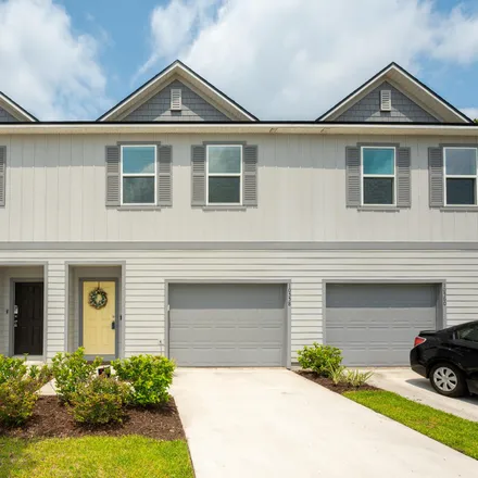 Buy this 3 bed townhouse on 10558 Madrone Cove Court in Jacksonville, FL 32218