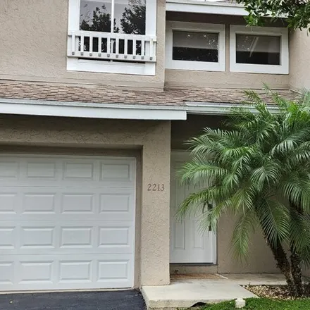 Rent this 2 bed townhouse on 2263 Discovery Circle West in Crystal Lake, Deerfield Beach