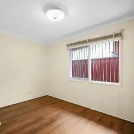 Rent this 3 bed apartment on Orleans Crescent in Toongabbie NSW 2146, Australia