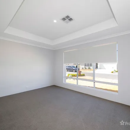 Rent this 4 bed apartment on Coasting Road in Alkimos WA 6038, Australia
