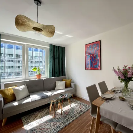 Rent this 1 bed apartment on Stanisława Moniuszki 10 in 00-009 Warsaw, Poland
