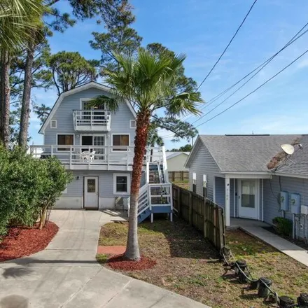 Buy this 5 bed house on 6118 Pinetree Avenue in Lower Grand Lagoon, Panama City Beach