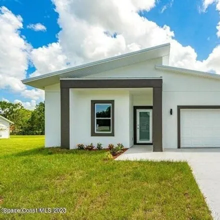 Buy this 3 bed house on 1000 Tetzel Street Southeast in Palm Bay, FL 32909