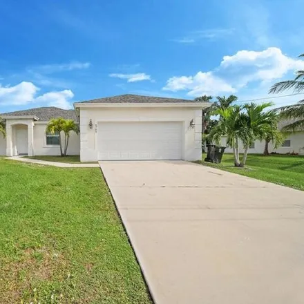 Buy this 4 bed house on 6817 Northwest Dorothy Street in Port Saint Lucie, FL 34983