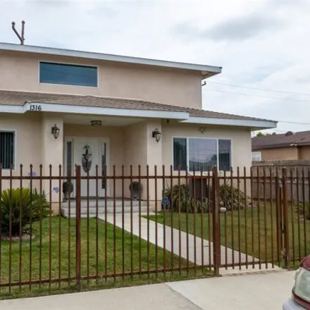 Buy this 4 bed house on 1316 W 151st St in Compton, California