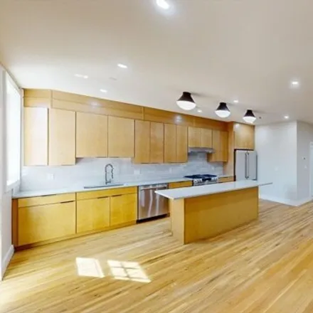 Rent this 4 bed apartment on 145 Sutherland Road in Boston, MA 02135