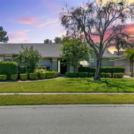 Buy this 4 bed house on 4087 Kiawa Drive in Hunter's Creek, Orange County