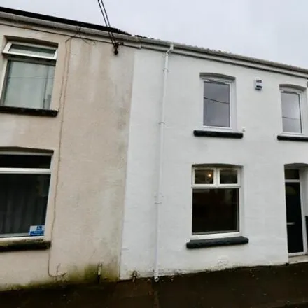Rent this 3 bed townhouse on Greenfield Street in Gilfach, CF81 8RW