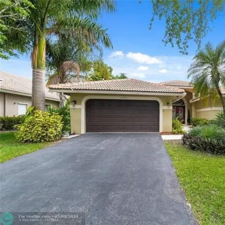 Buy this 4 bed house on 10422 Northwest 49th Place in Brookside North, Coral Springs