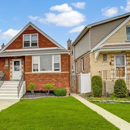 Buy this 3 bed house on 5619 South Meade Avenue in Chicago, IL 60638