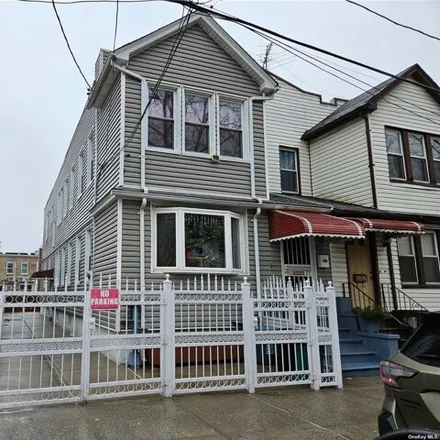 Buy this 5 bed house on 85-17 101st Street in New York, NY 11418