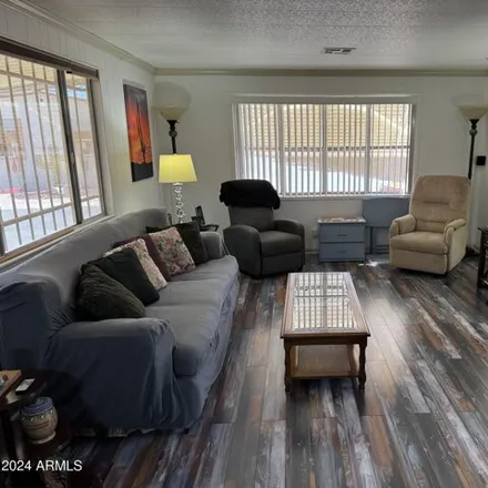 Buy this studio apartment on North 114th Street in Maricopa County, AZ 85120