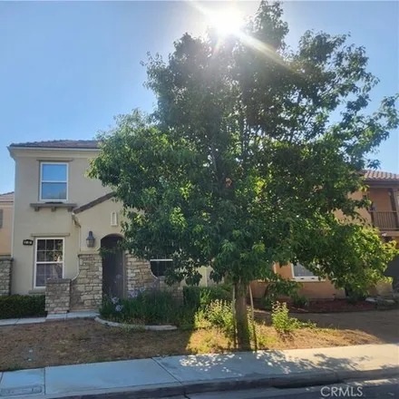 Rent this 4 bed house on 5503 Martingale Way in Fontana, CA 92336