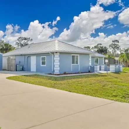 Buy this 3 bed house on 390 Greenwood Avenue in Lehigh Acres, FL 33936