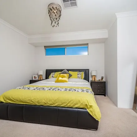Rent this 4 bed apartment on Rugosa Lane in Jindalee WA 6038, Australia