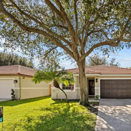 Buy this 3 bed house on 12280 Dartmoor Drive in Wellington, Palm Beach County