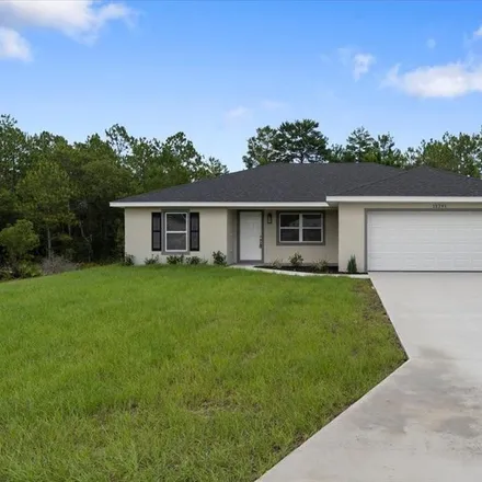 Buy this 3 bed house on 5113 Southwest 154th Loop in Marion County, FL 34473