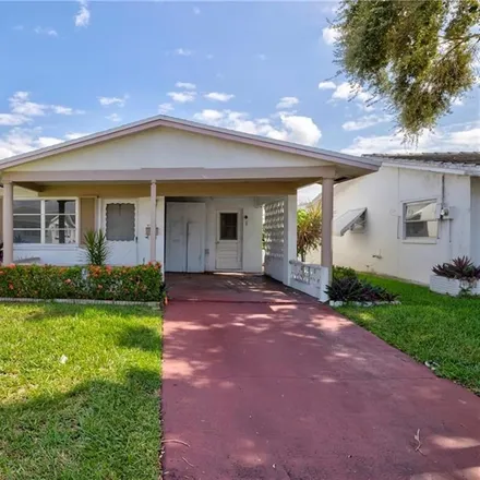 Buy this 2 bed house on 4900 Northwest 48th Avenue in Tamarac, FL 33319
