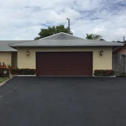 Buy this 3 bed house on 3260 Northwest 63rd Street in Palm Aire, Fort Lauderdale