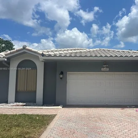 Rent this 3 bed house on 12191 Natalies Cove Road in Cooper City, FL 33330