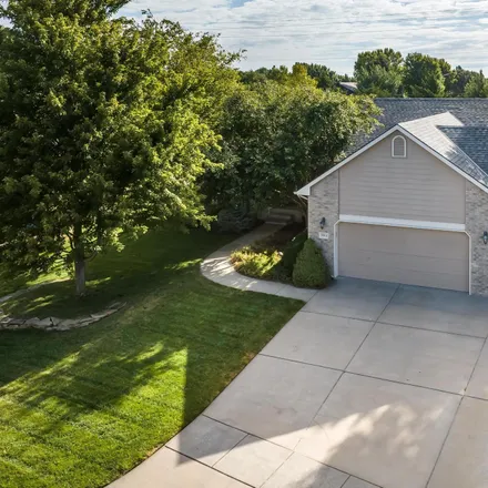 Buy this 4 bed house on 3014 North Brush Creek Circle in Wichita, KS 67205