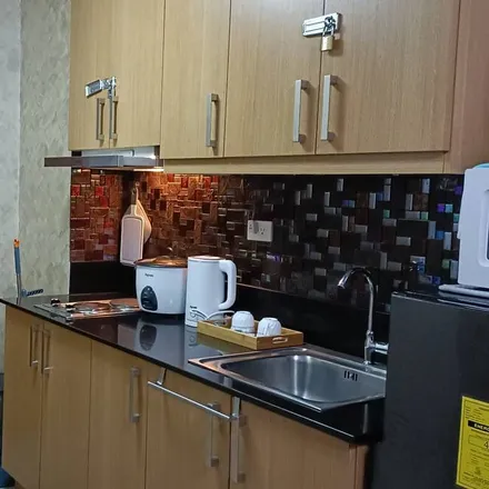 Rent this 2 bed condo on Pasay in Southern Manila District, Philippines
