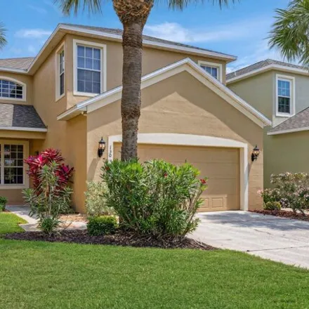 Buy this 4 bed townhouse on 116 White Ibis Lane in Melbourne, FL 32903