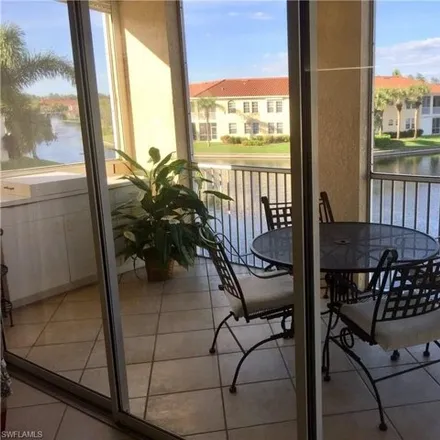 Rent this 3 bed condo on L'Ambiance Circle in Pelican Bay, FL 34108