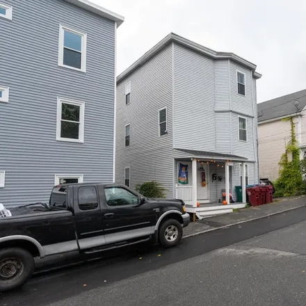Buy this 9 bed townhouse on 8;10 Marsh Street in Lowell, MA 01854