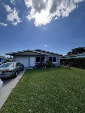 Buy this 4 bed house on 655 Southwest 8th Avenue in Delray Beach, FL 33444